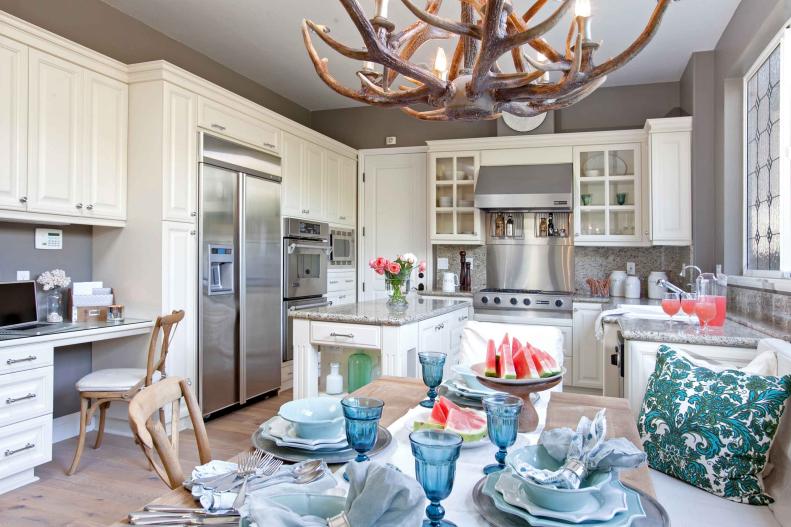 Cottage Gray Kitchen With White Cabinets & Stainless Steel Appliances