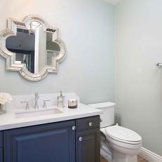 Transitional Bathroom Boasts Quatrefoil Mirror