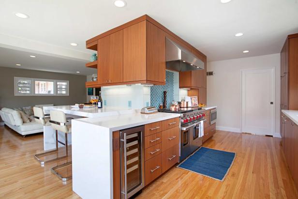 Large Open Midcentury Modern Kitchen With Woodgrain Cabinets
