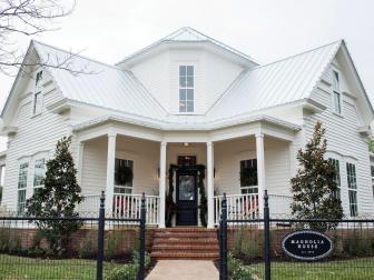 The newly renovated Magnolia House bed and breakfast has been transformed from the inside out. The exterior has a new brick skirt, updated paint, metal roof, and landscaping, as seen on Fixer Upper. (After #17)