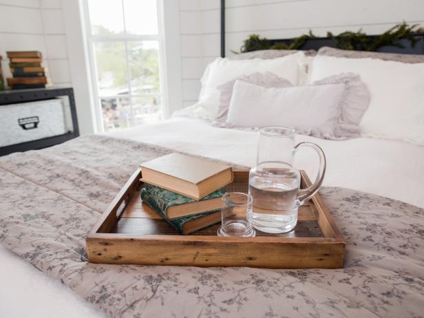 The bedroom on the second story of the Magnolia House bed and breakfast is spacious after it was converted from a common room, as seen on Fixer Upper. (after)