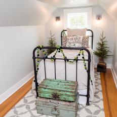 Small Cozy Hideaway Bedroom With Small Christmas Tree