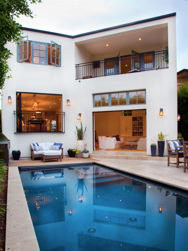 White Home Exterior With Pool and Patio