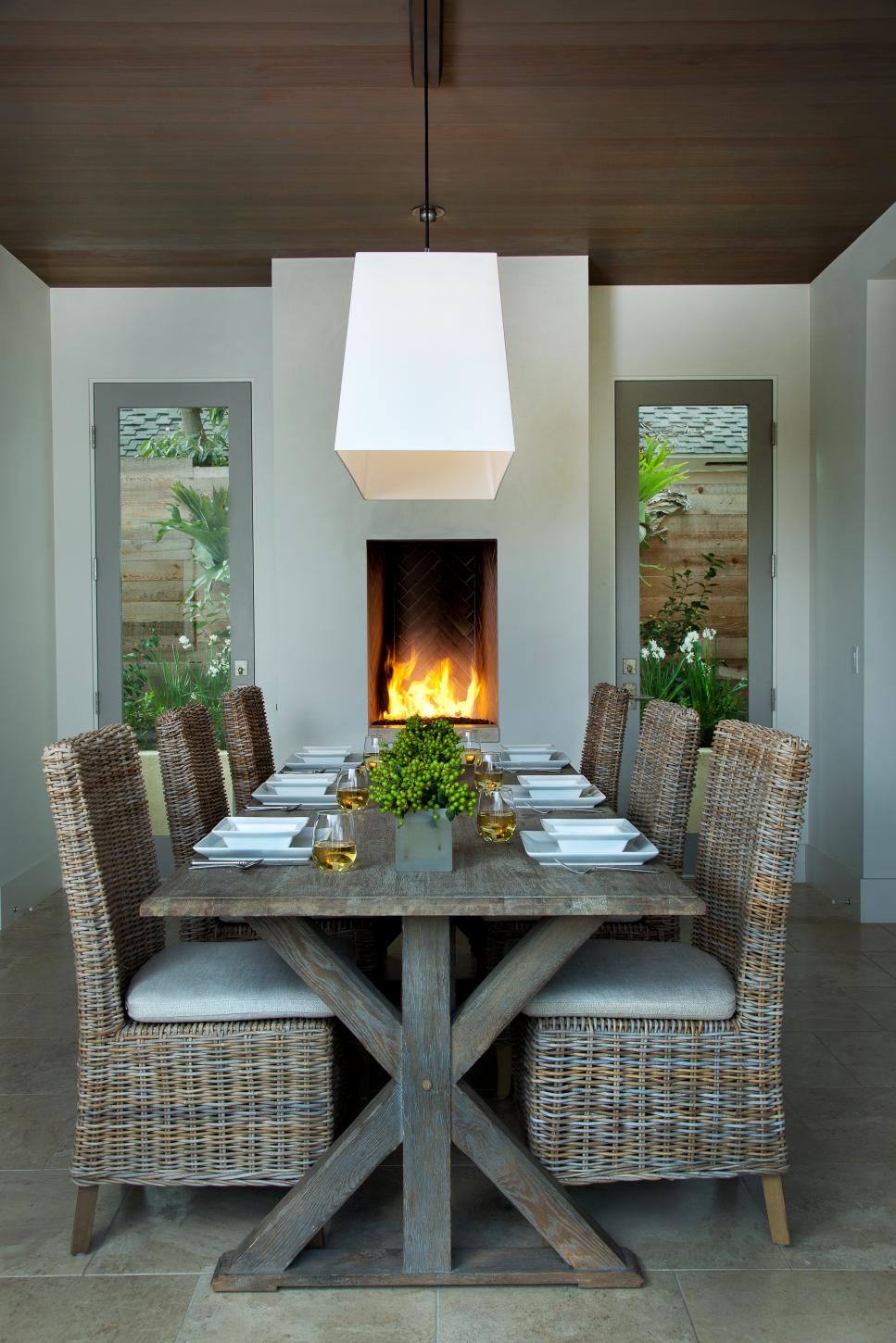 An Open Air Dining Room With Fireplace And Garden Courtyard Views | HGTV