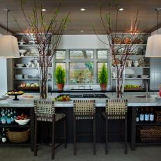 A Kitchen Complements A Garden Courtyard With Flourishing Topiary Accents  