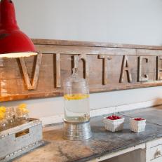 Vintage Wood Sign and Red Pendant Lights 