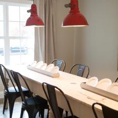 Dining Room With Red Pendant Lights 