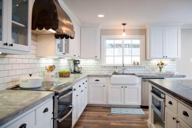 Kitchen With White Cabinets And Copper Vent Hood Hgtv