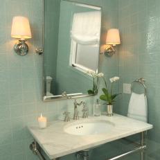 Light Green Bathroom Features Marble-Topped Console Sink