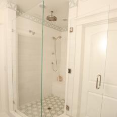 White Transitional Shower Features Frameless Glass Enclosure