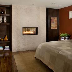 Handsome, Contemporary Bedroom Features Sleek Inset Fireplace