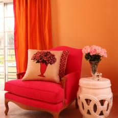 Bright, Bold Transitional Sitting Area Features Upholstered Armchair & Drapery