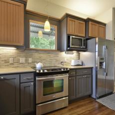 Two-Toned Kitchen Cabinets With Mosaic Tile Backsplash