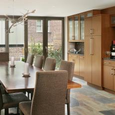 Brown Transitional Dining Room With Branch Chandelier