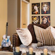 Masculine Living Room Boasts Portraits of Famous Musicians