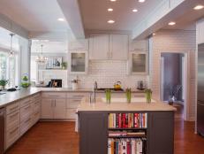 White Transitional Kitchen With White Cabinets and Gray Island