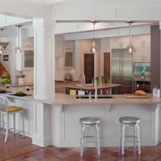 Transitional White Kitchen With Spacious Breakfast Bar
