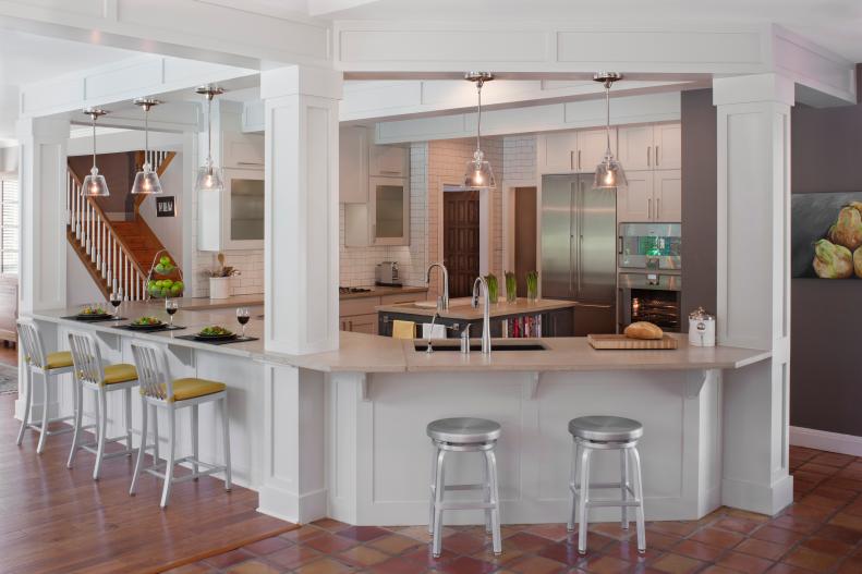 Transitional Kitchen With White Cabinets & Neutral Countertops