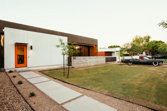 White and Brown Modern Home Exterior and Front Yard With Walkway