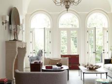 Bright, Transitional Living Room With French Doors & Large Chandelier
