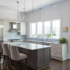 White Transitional Open Plan Kitchen With Gray Island