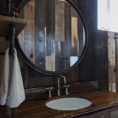 Round Bathroom Mirror and Rustic Wood Vanity