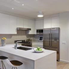 Modern Condo Kitchen With Crisp White Cabinets