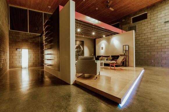 Modern Stage-Like Living Space With Raised Wood Floor