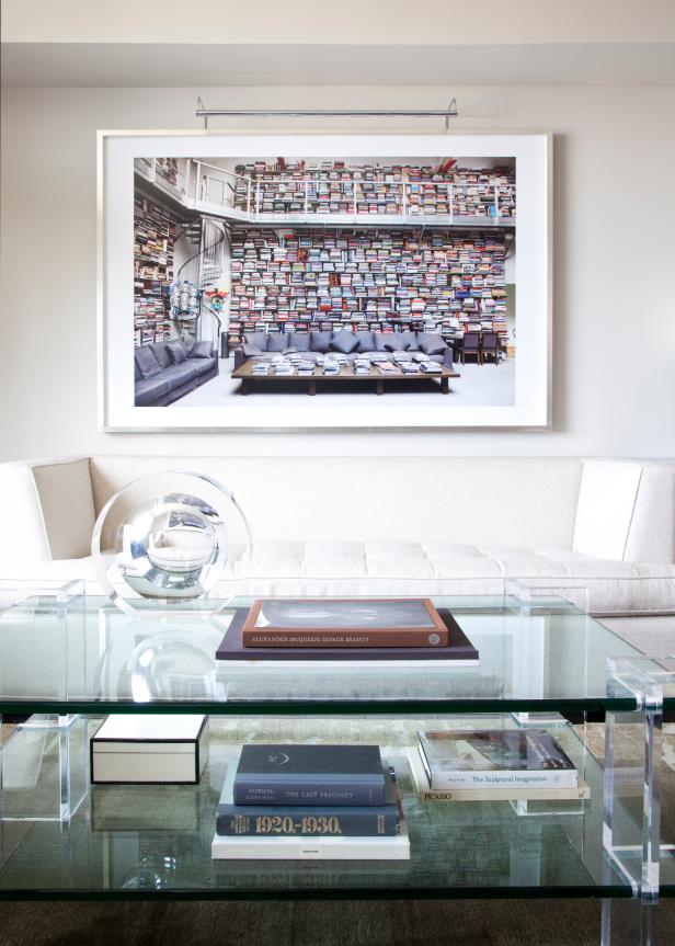 Modern Living Space With White Sofa & Glass Coffee Table