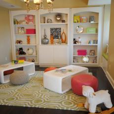 Eclectic Yellow Playroom With Built-In Bookshelves