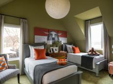This kid-friendly bedroom is packed with playful colors, geometric patterns and Texas touches.
