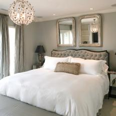 Sophisticated Gray Bedroom With Whimsical Chandelier