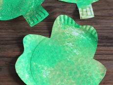 Make a textured, bright shamrock using everyday household objects. Kids can practice their cutting skills, coordination with a rolling pin and learn about different shades of colors.