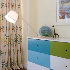Modern Kids Bedroom With Multicolored Dresser