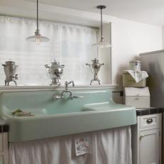 White Laundry Room Features Mint Green Sink
