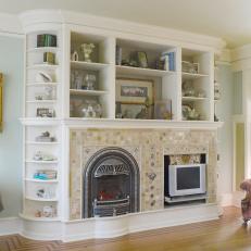 Custom Bookshelf & Fireplace in French-Inspired Living Room