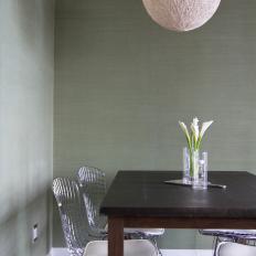 Transitional Dining Room With Textured Globe Light