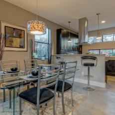 Eat-In Light Gray Kitchen With Glass Dining Table