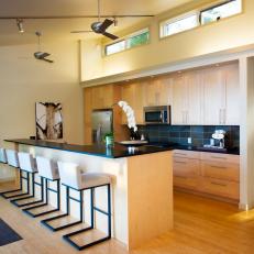 Contemporary Kitchen With Light Wood Cabinetry