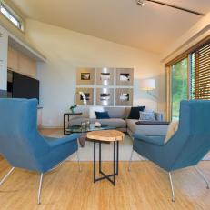 Modern Living Room Features Funky Blue Armchairs