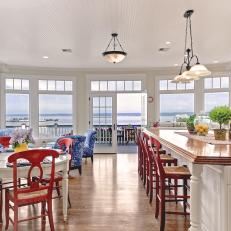 White Coastal Kitchen with Wrap-Around Windows and Puget Sound Views