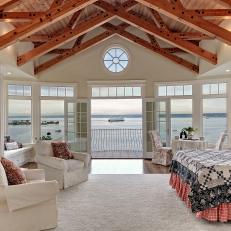 Spacious Coastal Bedroom With Vaulted Ceiling