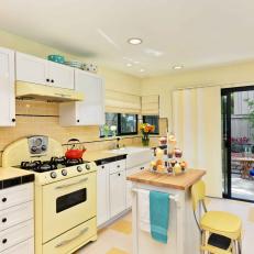 Retro Kitchen With Yellow Stove and Movable Island