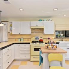 Sunny, Yellow Kitchen With Storage-Friendly White Cabinetry