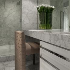 Vanity Stool in Marble-Clad Bathroom