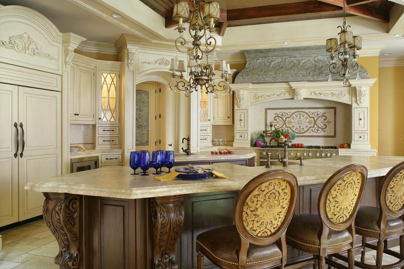 Yellow Kitchen With Wood Island, Ornate Molding & Chandeliers
