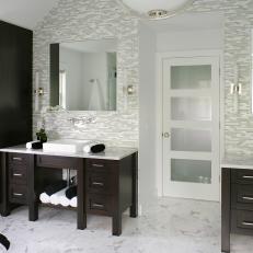 Contemporary White Bathroom Features Dark Wood Vanities
