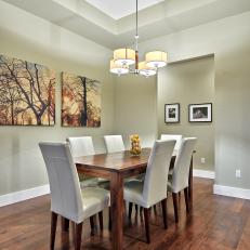 Bright, Transitional Dining Room With White Leather Chairs