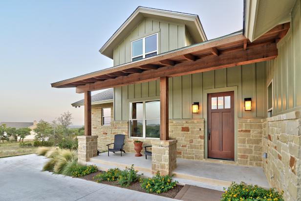 Green Craftsman Exterior With Neutral Stone & Brown Wood Door