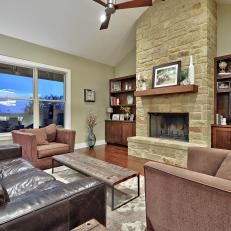 Neutral Transitional Living Room With Stone Fireplace